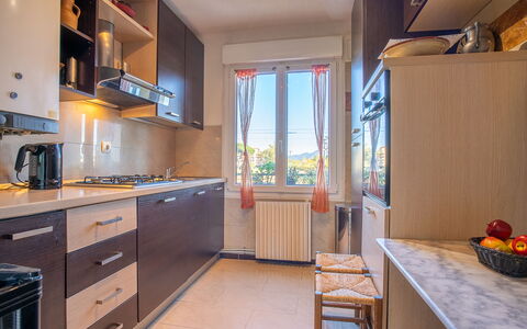 Le Grand Parc: Cabinetry, Countertop, Property, Furniture, Kitchen, Wood, Architecture, Building, Table, Drawer