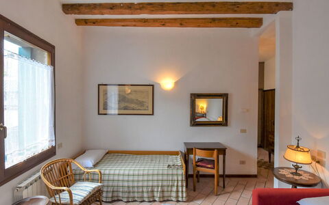 Barbaria de le Tole: Table, Property, Furniture, Picture Frame, Wood, Comfort, Interior Design, Floor, Window, Flooring