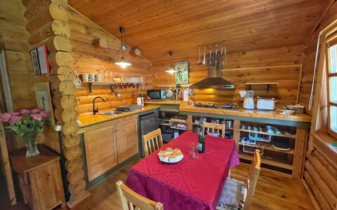 Birdieferienhaus: Table, Furniture, Property, Tableware, Wood, Window, Interior Design, Cabinetry, Floor, Chair