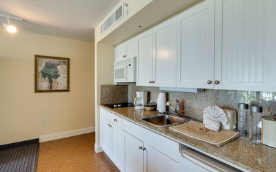 Gulf Resort 10.10: Cabinetry, Property, Countertop, Sink, Tap, Kitchen Sink, Wood, Building, Interior Design, Plumbing Fixture