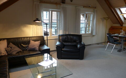 Altstadt Loft: Couch, Furniture, Window, Building, Table, Wood, Shade, Comfort, Studio Couch, Interior Design