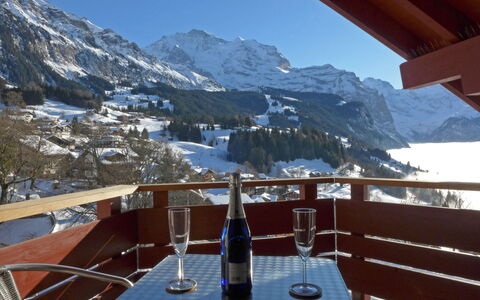 Wengen 19: Sky, Mountain, Property, Snow, Tableware, Highland, Cloud, Building, Table, Glacial Landform