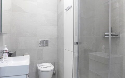 Haus Gertsch Apt.g: Bathroom, Building, Black, Purple, Toilet, Door, Toilet Seat, Plumbing Fixture, Floor