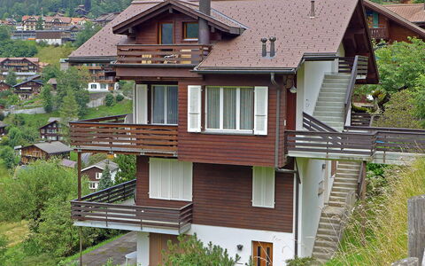 Melodie Apt.w: Building, Window, House, Plant, Wood, Tree, Land Lot, Cottage, Neighbourhood, Urban Design
