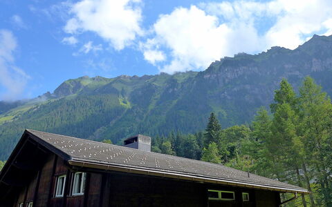 Zur Linde Apt.w: Mountainous Landforms, Mountain, Highland, Mountain Range, Sky, Hill Station, Natural Landscape, Alps, Wilderness, House