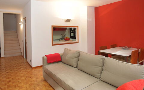 Vila Olimpica Pamplona: Room, Property, Furniture, Interior Design, Living Room, Floor, Red, Building, Orange, Wall