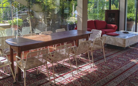 Villa Quattro Mori: Furniture, Flooring, Wood, Interior Design, Floor, Table, Chair, Room, Living Room, Coffee Table