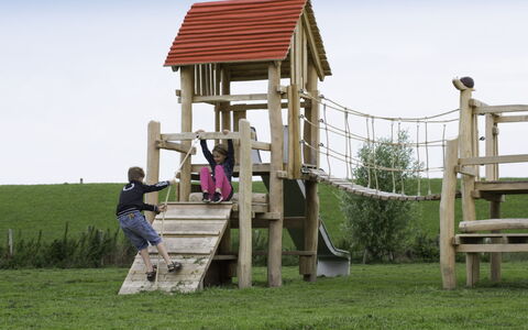 Ganuenta: Public Space, Playground, Outdoor Play Equipment, Human Settlement, Playground Slide, Recreation, Fun, Grass, Tree, Leisure