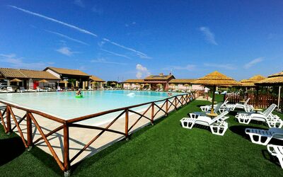 Cecina 400: Resort, Property, Swimming Pool, Sky, Building, Real Estate, Vacation, Grass, House, Town