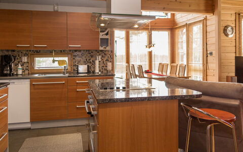 Syvärinkulta B: Furniture, Kitchen, Countertop, Interior Design, Flooring, Cabinetry, Kitchen Appliance, Wood, Chair, Floor