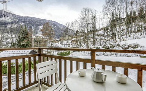 Saint Gervais 172: Table, Sky, Cloud, Property, Furniture, Plant, Tableware, Snow, Fence, Wood