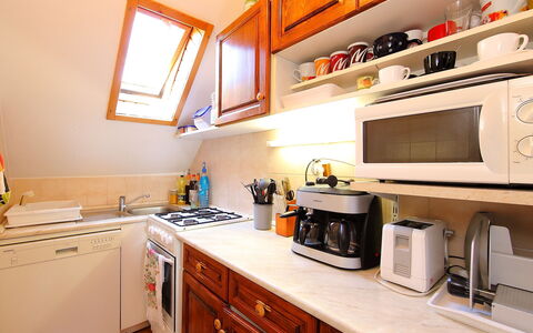 Zsuzsi: Countertop, Room, Kitchen, Property, Cabinetry, Furniture, Building, Interior Design, Yellow, Orange