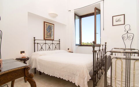 'O Pignatiello: Furniture, Building, Property, Window, Comfort, Table, Interior Design, Picture Frame, Bed Frame, Wood