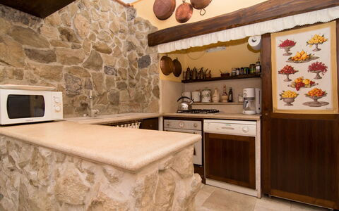 'O Pignatiello: Countertop, Cabinetry, Property, Building, Kitchen, Kitchen Appliance, Kitchen Stove, Wood, Interior Design, Home Appliance