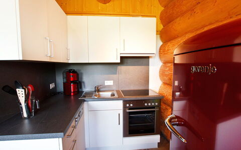 Grosserlach 100: Property, Countertop, Room, Kitchen, Cabinetry, Furniture, Orange, Kitchen Stove, House, Interior Design
