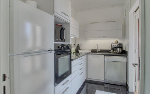 Les Terrasses: Cabinetry, Kitchen Appliance, Countertop, Home Appliance, Kitchen, Kitchen Stove, Building, Major Appliance, Floor, Flooring