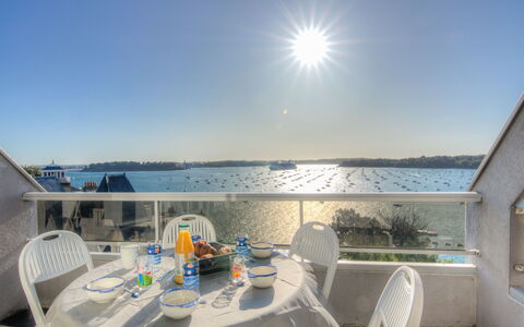 Dinard 153: Water, Sky, Table, Furniture, Building, Chair, Outdoor Furniture, Window, House, Shade
