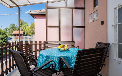 Peach: Furniture, Chair, Table, Porch, Interior Design, Outdoor Furniture, Outdoor Table, Home, Door, Balcony