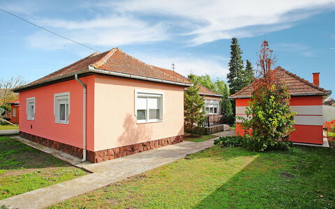 Apricot: Cloud, Sky, Plant, Building, Window, Tree, House, Land Lot, Wood, Grass
