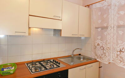 Il Ligustro 300.7: Room, Property, Kitchen, Cabinetry, Countertop, Furniture, Tile, Interior Design, House, Floor