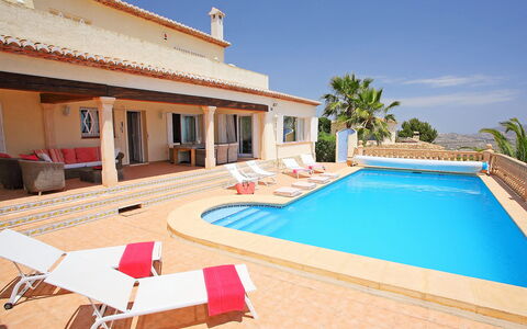 Karibuni: Sky, Property, Water, Building, Swimming Pool, Shade, Plant, House, Tree, Wood