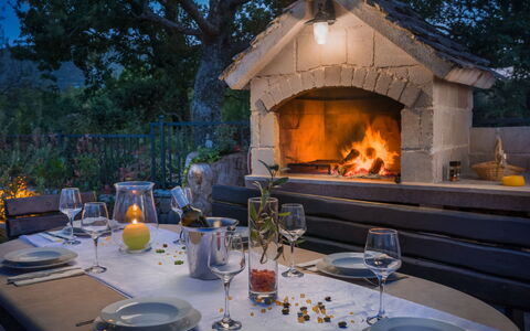 Villa Dalmatica Moderna: Property, Home, Heat, Lighting, Fireplace, Backyard, Masonry Oven, Room, Hearth, House