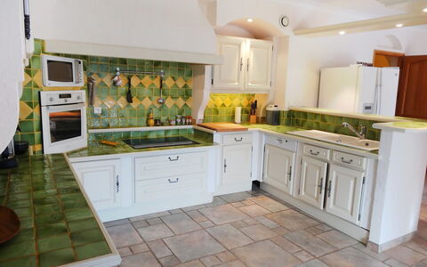 Le Bouloulou: Countertop, Kitchen, Property, Room, Cabinetry, Furniture, Interior Design, Floor, Tile, Building