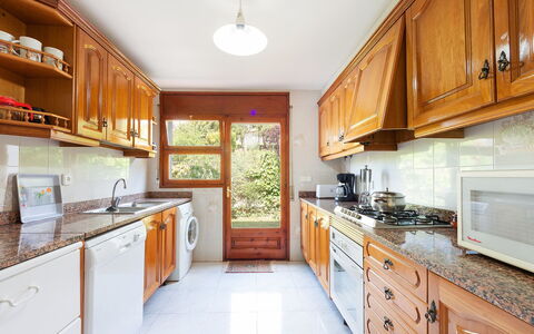 Mas Vila: Countertop, Property, Cabinetry, Room, Kitchen, Furniture, Building, Yellow, Real Estate, Interior Design