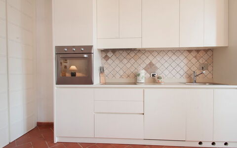 Rio Marina 400: Tile, Room, Furniture, Property, Cabinetry, Kitchen, Floor, Interior Design, Countertop, Flooring