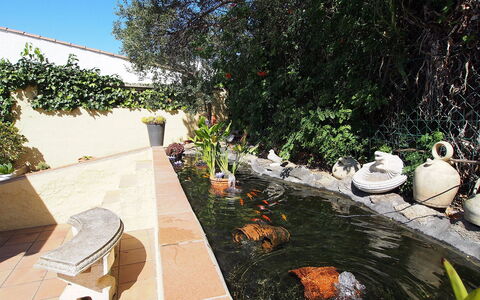 Mila i Fontanals: Property, Real Estate, Tree, Architecture, Pond, Leisure, House, Plant, Vacation, Roof
