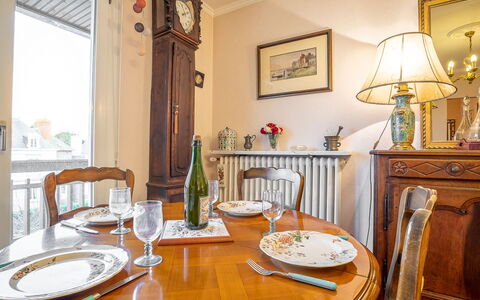 Cardella: Table, Furniture, Picture Frame, Property, Tableware, Dishware, Chair, Lighting, Wood, Plate