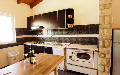 Villa Ana: Countertop, Room, Property, Kitchen, Kitchen Stove, Cabinetry, Furniture, Interior Design, Building, House