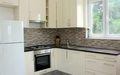 Gabriela: Countertop, Kitchen, Room, Property, Cabinetry, Furniture, Tile, Major Appliance, Interior Design, Kitchen Stove