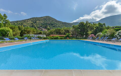 Nisporto 100: Water, Sky, Cloud, Swimming Pool, Plant, Azure, Tree, Rectangle, Shade, Building