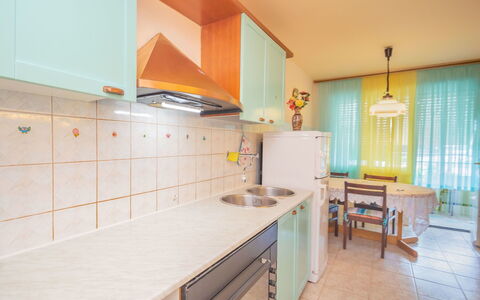 Martinović: Cabinetry, Furniture, Property, Countertop, Wood, Kitchen, Drawer, Orange, Interior Design, House