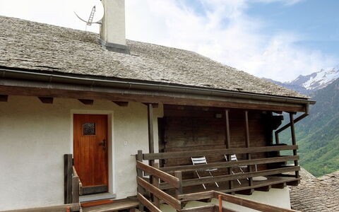 Mona: Property, House, Roof, Building, Cottage, Sky, Home, Mountain, Room, Architecture