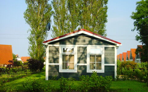Den Oever: House, Home, Property, Building, Real Estate, Architecture, Roof, Residential Area, Cottage, Tree