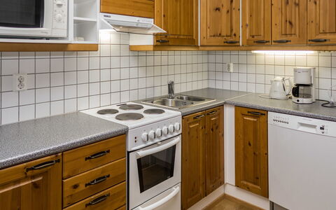 Karhunvartijan Linna B11: Kitchen, Countertop, Cabinetry, Kitchen Appliance, Wood, Major Appliance, Flooring, Interior Design, Sink, Floor