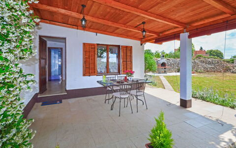 Ledi: Plant, Property, Building, Table, Flowerpot, Porch, Shade, Botany, Lighting, Interior Design