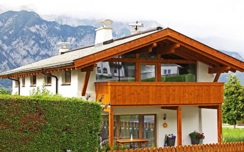 Lanner: Building, Property, Plant, Window, Sky, House, Porch, Cloud, Fence, Tree