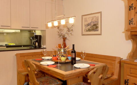 Schoneggacher Apt. S: Table, Furniture, Property, Cabinetry, Countertop, Wood, Interior Design, Building, Lighting, Kitchen