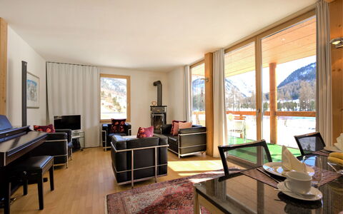 Chesa Lej: Picture Frame, Furniture, Table, Houseplant, Interior Design, Living Room, Floor, Chair, Wood