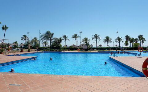 Playamar: Water, Sky, Plant, Property, Swimming Pool, Azure, Cloud, Tree, Outdoor Furniture, Leisure