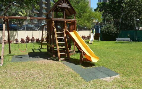 Playamar: Plant, Nature, Tree, Shade, Grass, Chute, Building, Leisure, Playground Slide, Playground