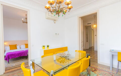 Eix.dret:roger de Lluria Valencia: Table, Property, Furniture, Building, Interior Design, Lighting, Orange, House, Yellow, Wood