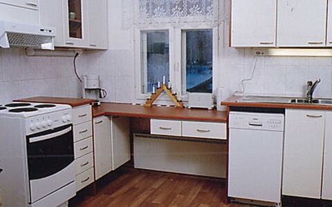 Eteläranta: Kitchen, Kitchen Appliance, Countertop, Cabinetry, Furniture, Flooring, Wood, Major Appliance, Interior Design, Kitchen Sink