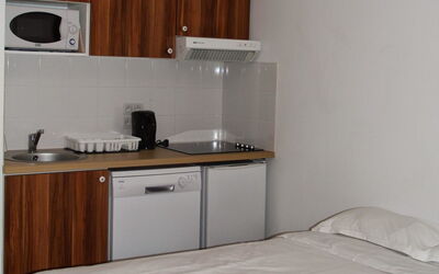 Adonis Valberg 1.1: Cabinetry, Countertop, Property, Furniture, Building, Tap, Wood, Kitchen Appliance, Kitchen, Interior Design