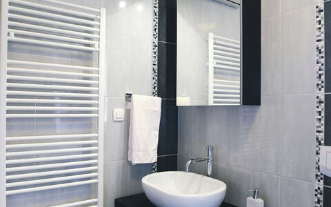 Lucija: Bathroom, Black, Room, Property, Tile, Plumbing Fixture, Toilet, Interior Design, Bathroom Cabinet, Wall