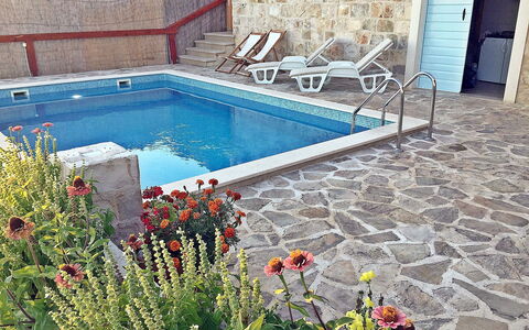 Juraj: Flower, Water, Plant, Blue, Swimming Pool, Rectangle, Grass, Outdoor Furniture, Flooring, Floor