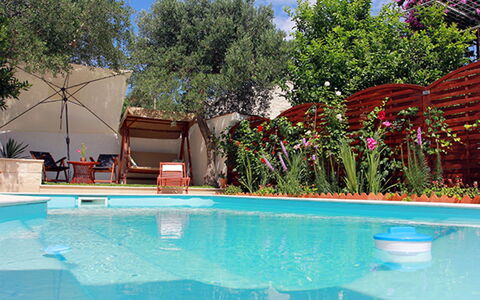 Silvija: Water, Plant, Sky, Swimming Pool, Building, Azure, Tree, Body Of Water, Shade, Leisure